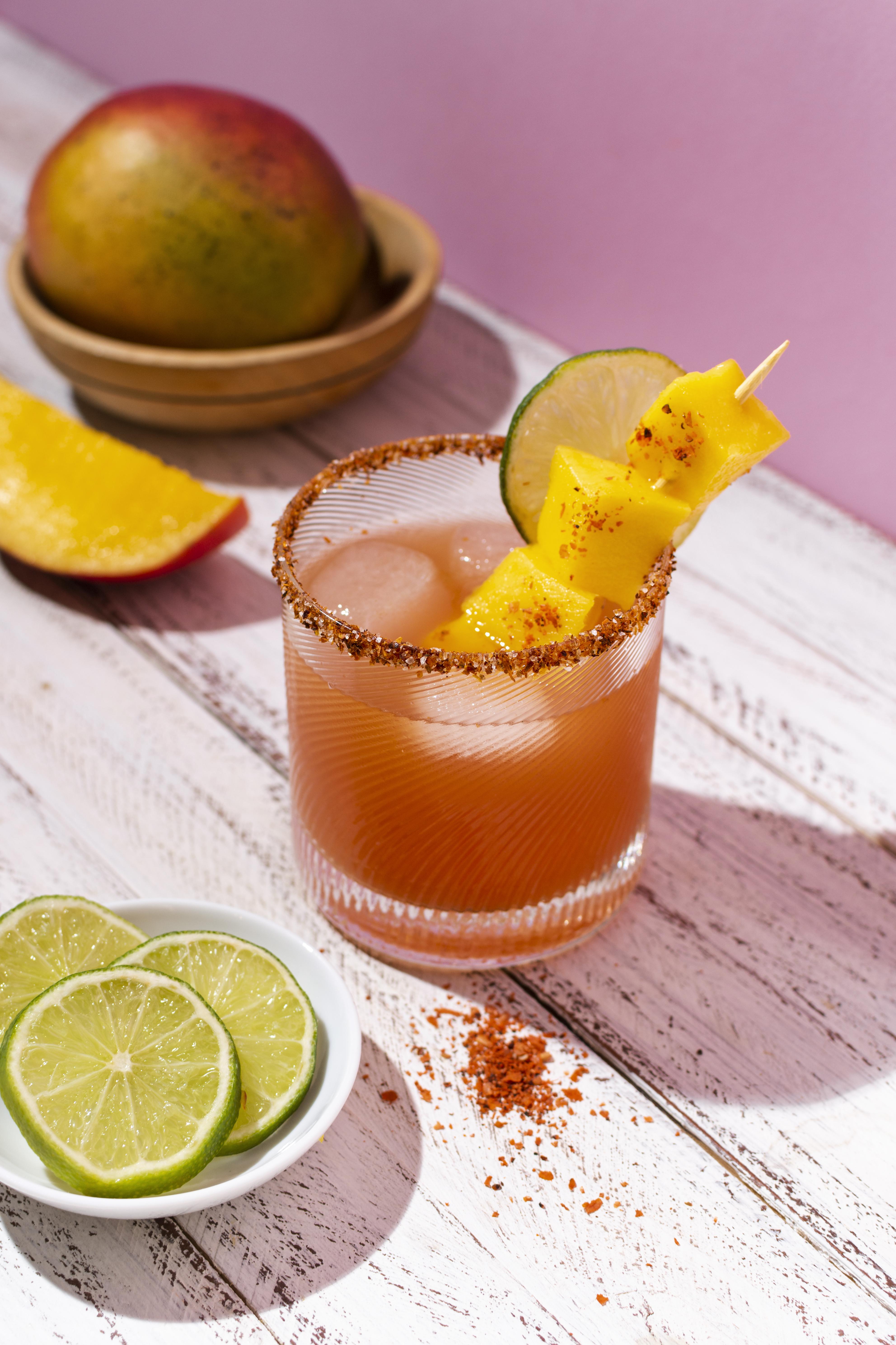 Reposado Mango Paloma with mango, lime, and chili salt rim
